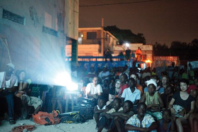 Screening of the Arcade Fire film ‘Planet Earth’ at the 2nd Ghetto Biennale 2011, Port-au-Prince, Haiti Photo: Jason Metcalf